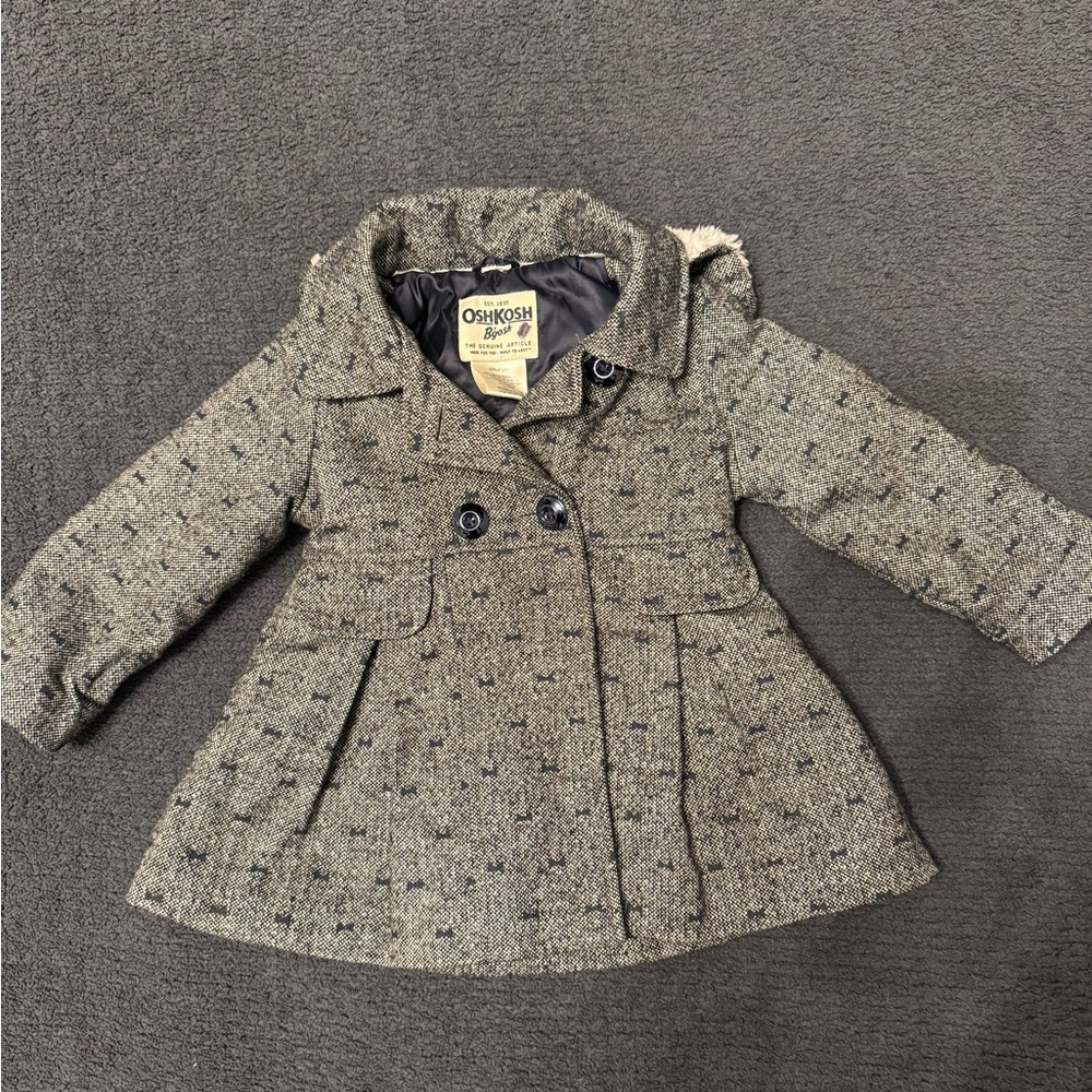 Adorable girls jacket with blue buttons and bow design